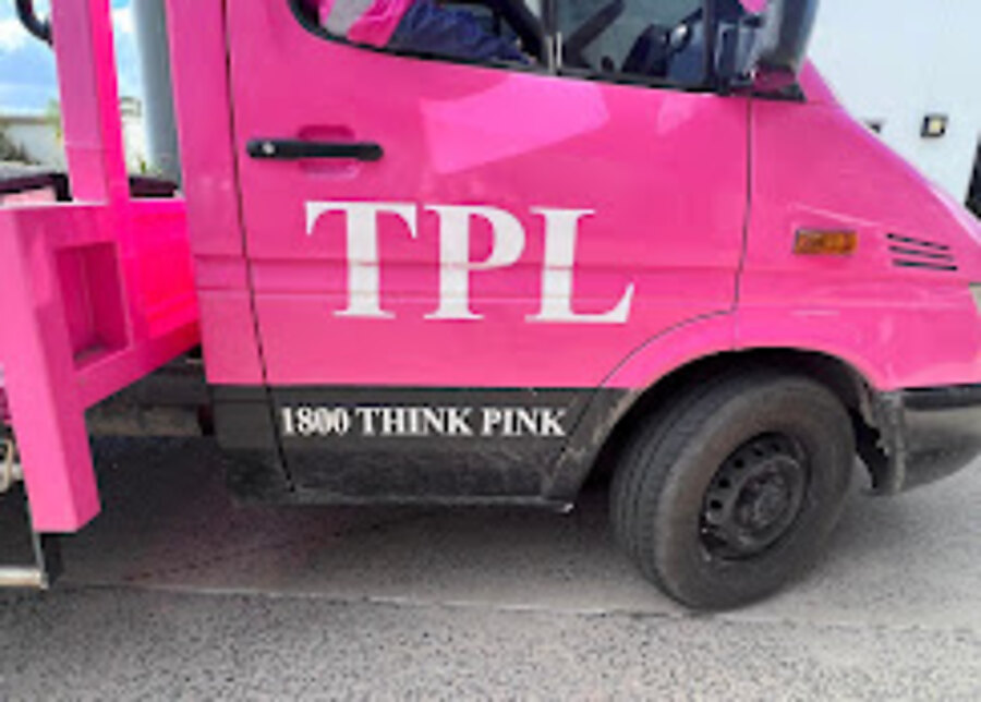 Close up of Think Pink Logistics TPL branding and 1800 THINK PINK on the truck